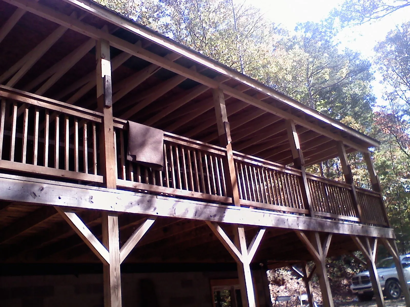 Timber framing under a new elevated porch and deck — Roof Leak Repair in Wells River by Roofing Brothers